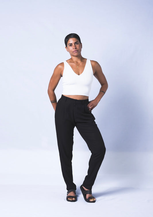 The Jogger Dress pants as crafted with hand-picked lightweight woven viscose fabric. Features deep pockets, button closure and pleats. Sizes XS-XL available.