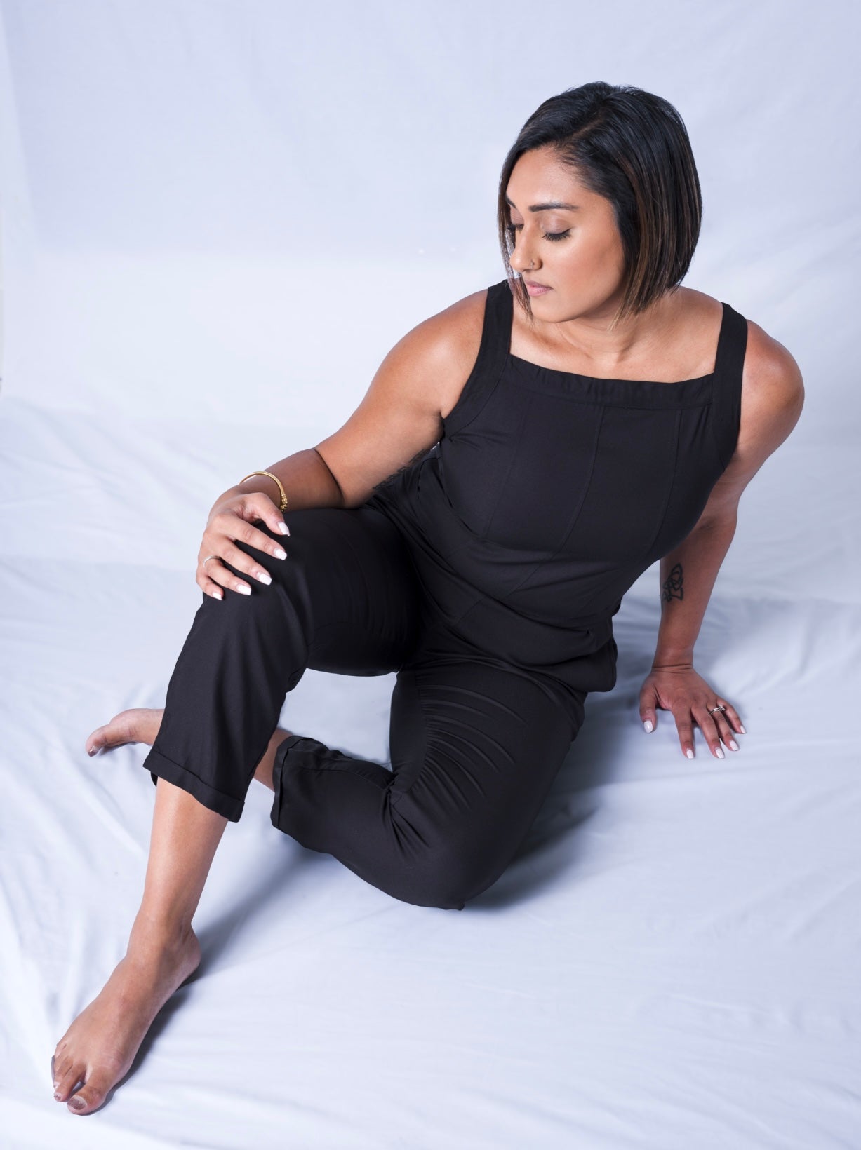 All In One Jumpsuit Model Sitting Waistband tied to back