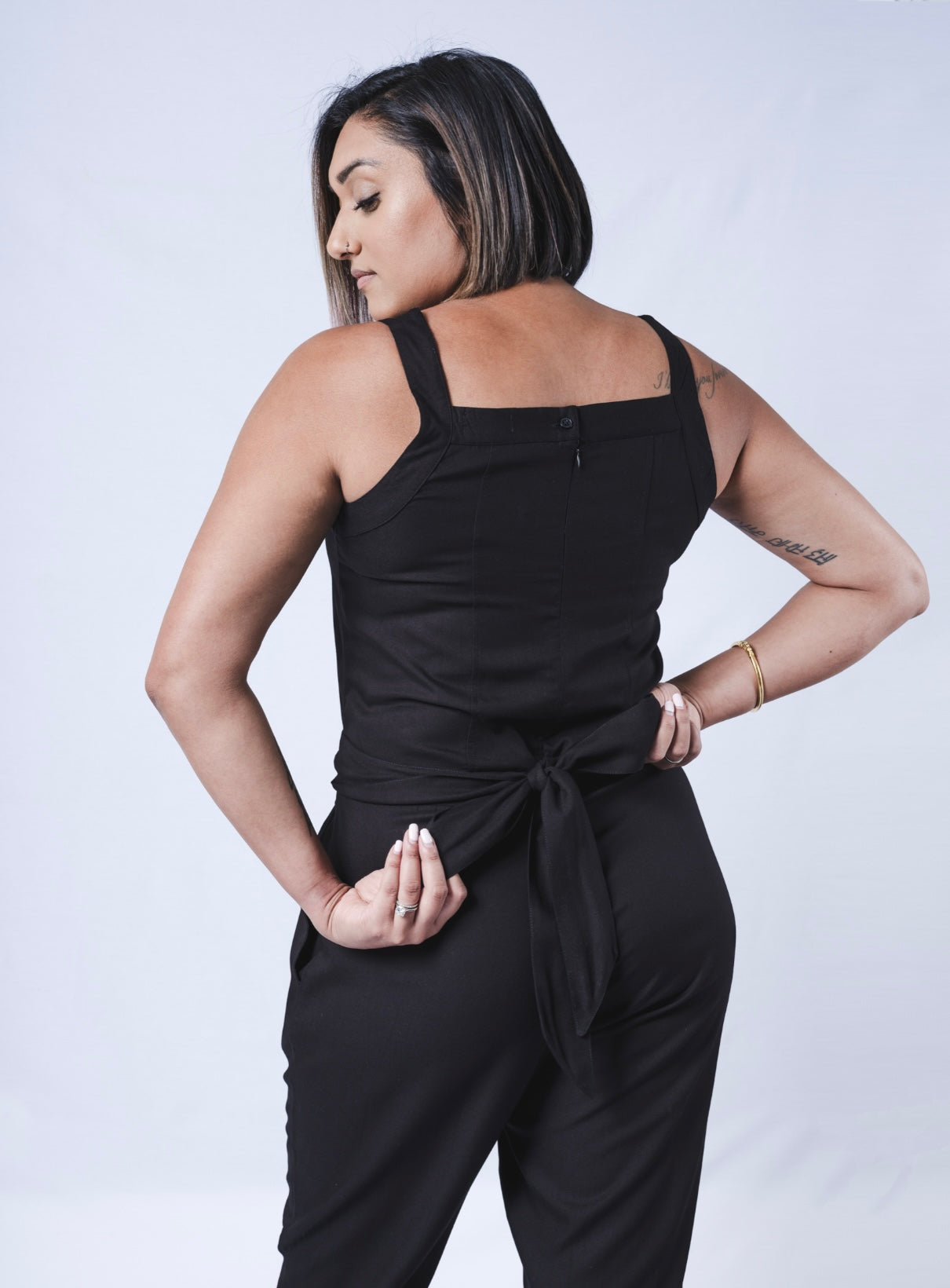 All In One Jumpsuit Model Standing tied waistband to back