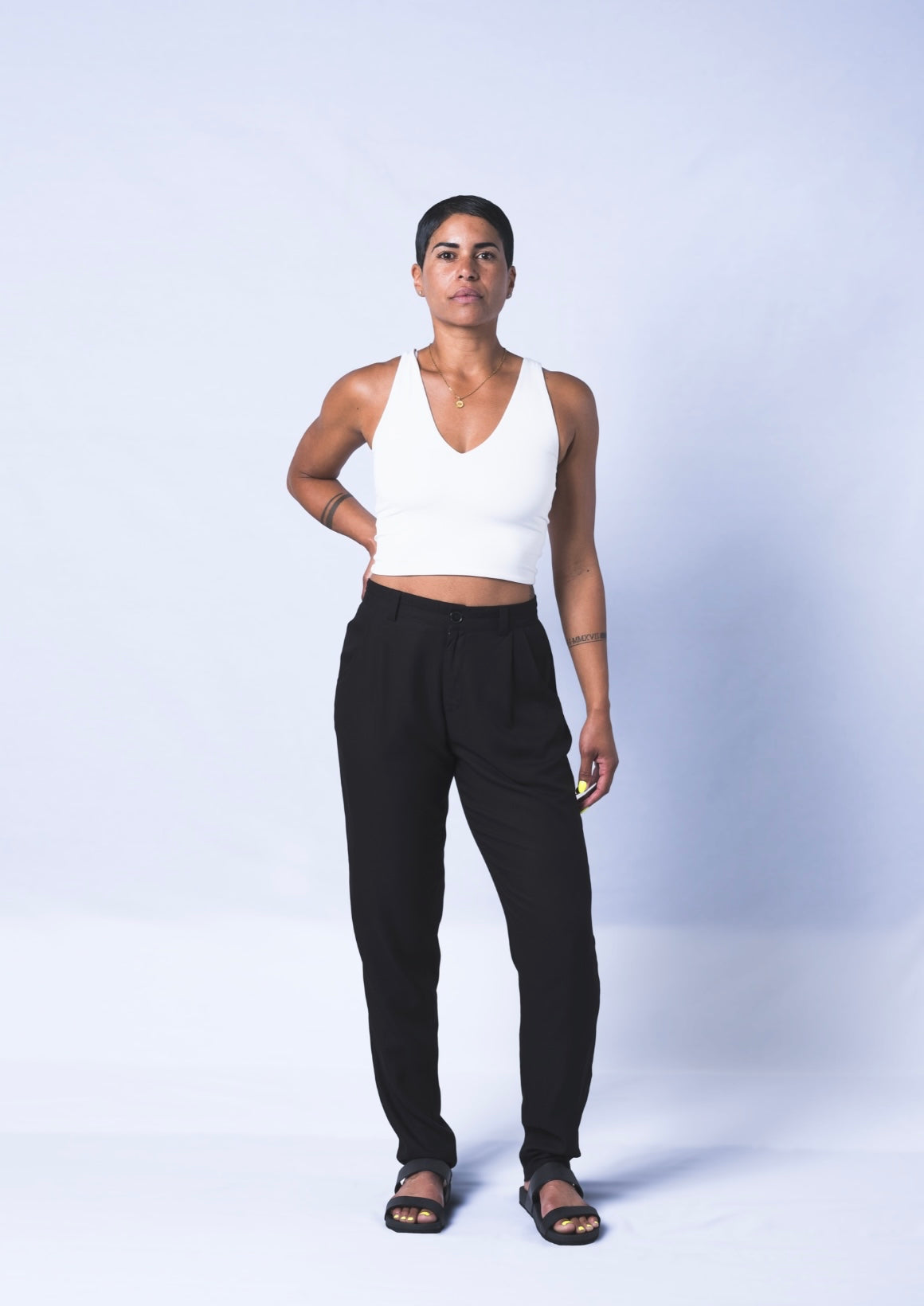 The Jogger Dress pants as crafted with hand-picked lightweight woven viscose fabric. Features deep pockets, button closure and pleats. Sizes XS-XL available.