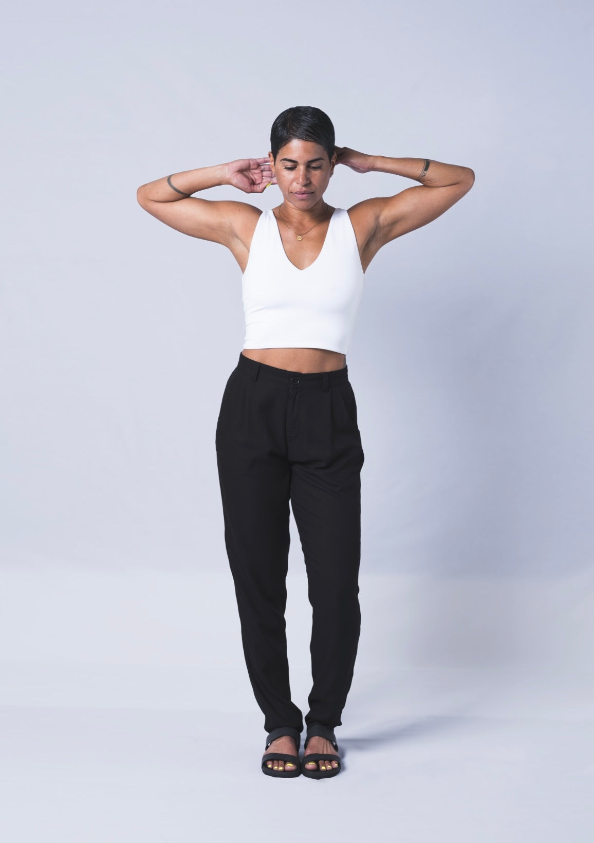 The Jogger Dress pants as crafted with hand-picked lightweight woven viscose fabric. Features deep pockets, button closure and pleats. Sizes XS-XL available.