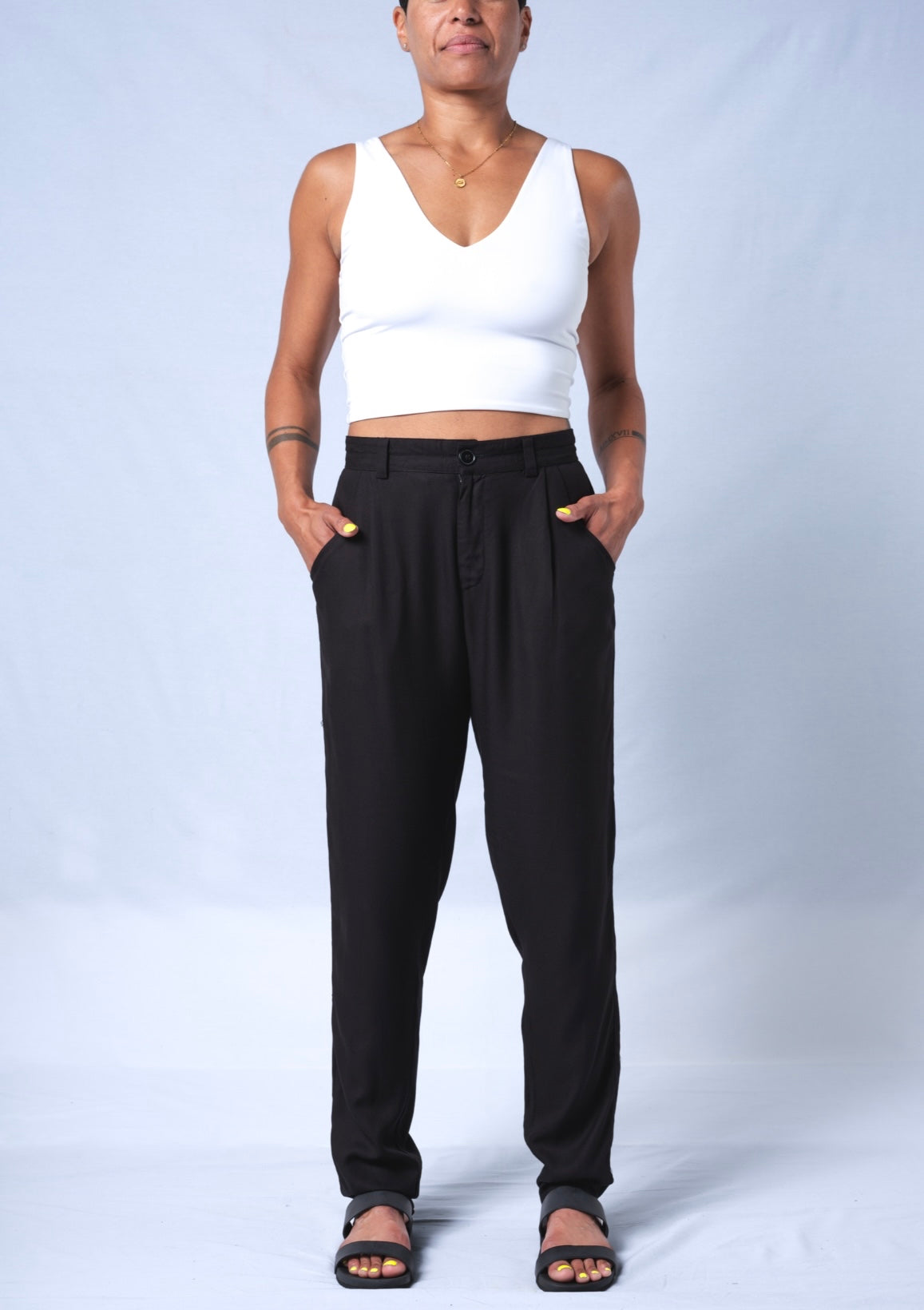 The Jogger Dress pants as crafted with hand-picked lightweight woven viscose fabric. Features deep pockets, button closure and pleats. Sizes XS-XL available.