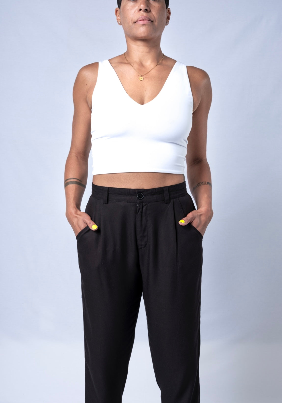 The Jogger Dress pants as crafted with hand-picked lightweight woven viscose fabric. Features deep pockets, button closure and pleats. Sizes XS-XL available.