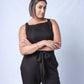 All In One Jumpsuit Model showing front of jumpsuit. Waistband tied to front