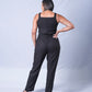 All In One Jumpsuit Model showing back of jumpsuit. Waistband tied to front
