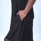 Black T-Shirt Dress side view with hands in pocket. Closer view