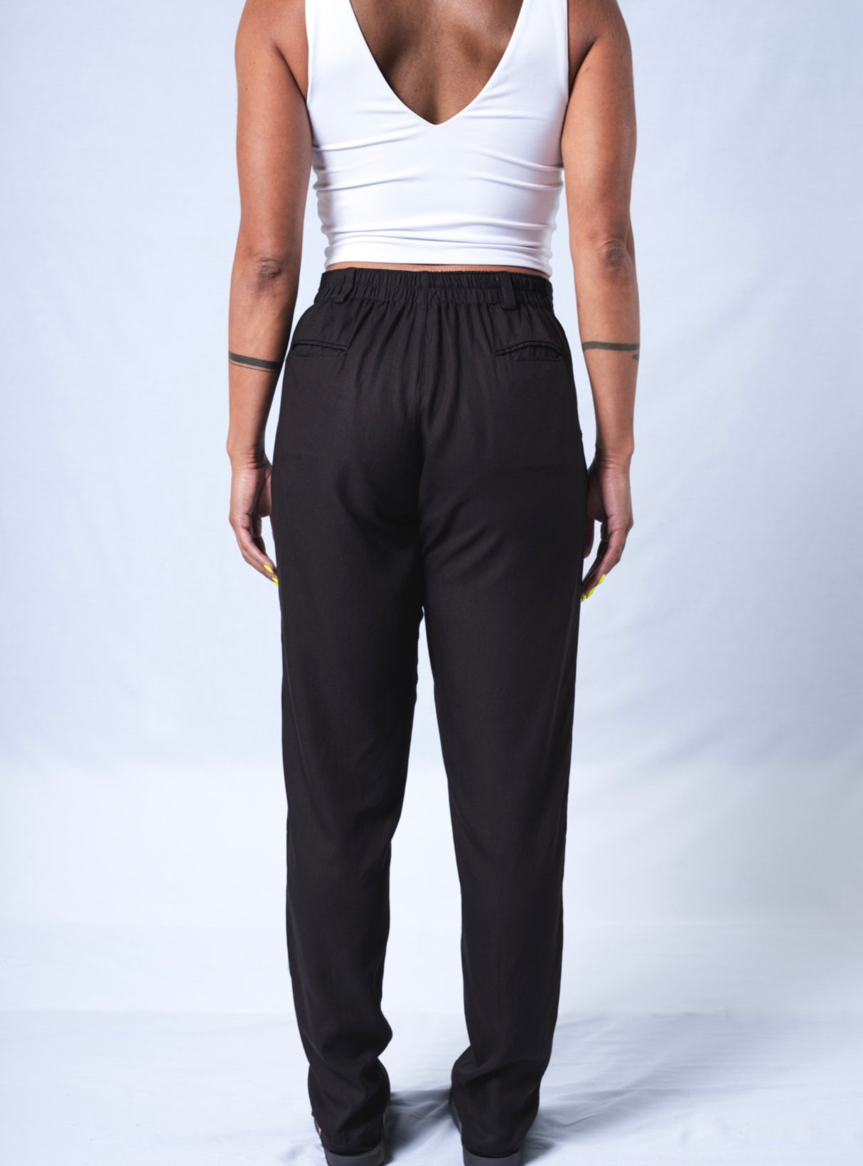 The Jogger Dress pants as crafted with hand-picked lightweight woven viscose fabric. Features deep pockets, button closure and pleats. Sizes XS-XL available.