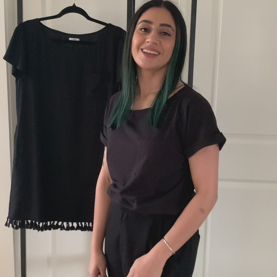 Lets talk about the details of the Black T-Shirt Dress. Video detailing how the black t-shirt dress can be worn.