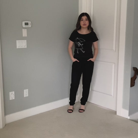 Watch the On The Move Basic Black T-Shirt worn. See all the details up close. Model is wearing a size Small. Sizes X-small to X-large avaiable. 