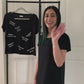 Lets talk about the details of the Travel Graphic Basic Black T-Shirt. Video detailing how the black t-shirt can be worn.